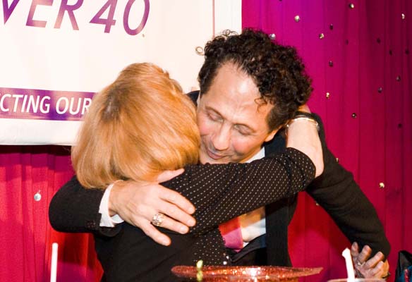 Nicole Barth and John Sefakis hugging